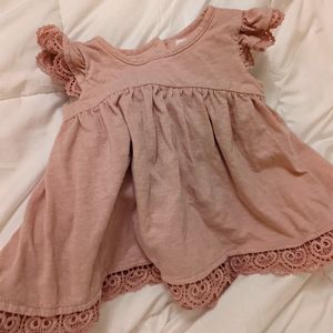 Baby girl mauve pink ruffled blouse
